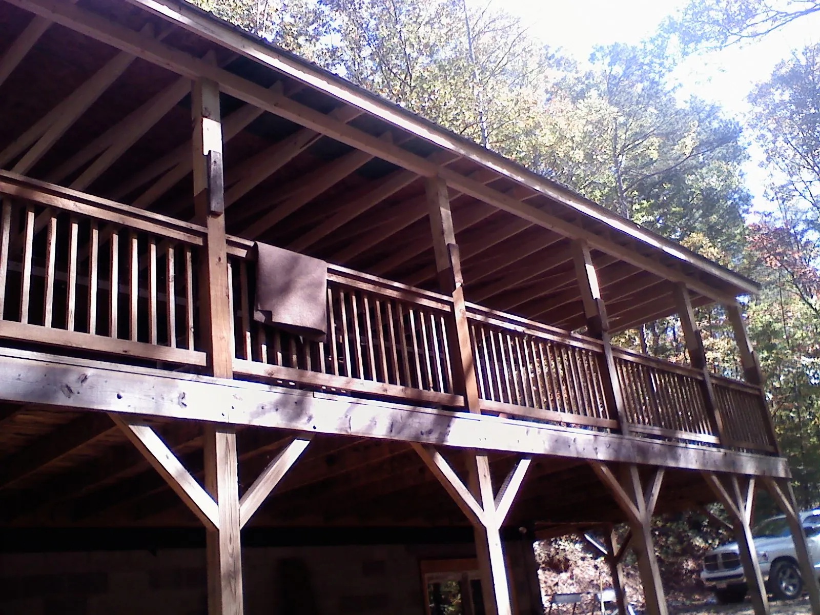 Timber framing under a new elevated porch and deck — Roof Leak Repair in Waban by Roofing Brothers